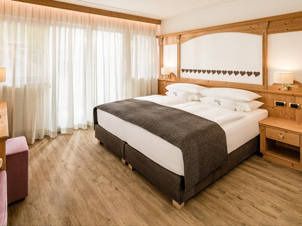 Schlafzimmer - Dolomiten Hotels