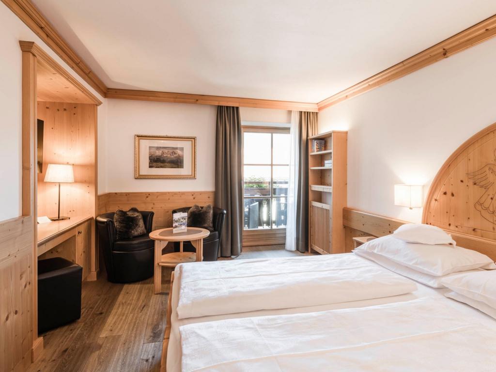 Bedroom of a hotel in Val Gardena, Italy