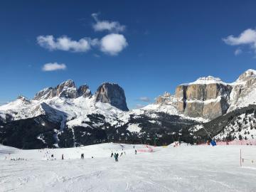 Skiing on the ski slope Belvedere in Val di Fassa